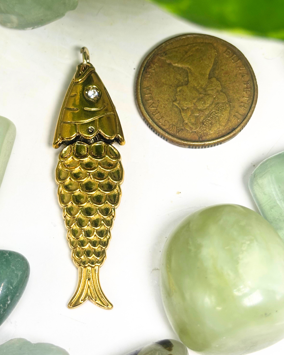 The Gold Moving Fish Charm
